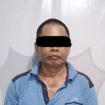 PEMERIKSAAN : Oknum ASN tampak tak berkutik ketika di tahan Polisi dari Polsek Manuhing usai menganiaya pria paruh baya. 