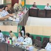 FOTO : Pj Sekda Katingan saat membukan kegiatan rapat Forum Komunikasi strategi peningkatan rekrutmen dan keaktifan peserta JKN.