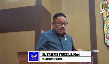 FOTO : Anggota DPRD Kabupaten Katingan Fahmi Fauzi, saat penyampaikan pendapat akhir fraksi partai NasDem.