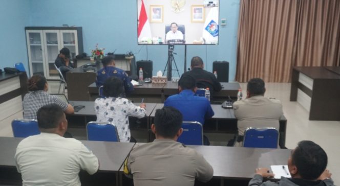 
					FOTO : Suasana rapat koordinasi nasional, secara virtual di aula Diskominfostandi Katingan.
