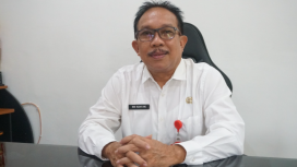 FOTO : Kepala Diskominfostandi Kabupaten Katingan, Wim.