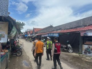 PATROLI : Suasana patroli Pamapta II Polres Gumas di perbankan dan pasar, Rabu, 1 April 2026.