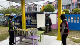 KAWAL : Personel Polwan Polres Gumas mengawal distribusi porsi MBG ke sejumlah sekolah, Senin, 27 April 2026.