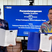 FOTO : Bank Kalteng diwakili oleh Pemimpin Cabang Utama, Empas S. Umar bersama PT Taspen (Persero) melalui Branch Manager Muchlis Herdian, Manager Keuangan Afri, dan Manager Layanan Anantian saat penandatanganan.